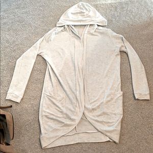 Hooded long open front sweater.